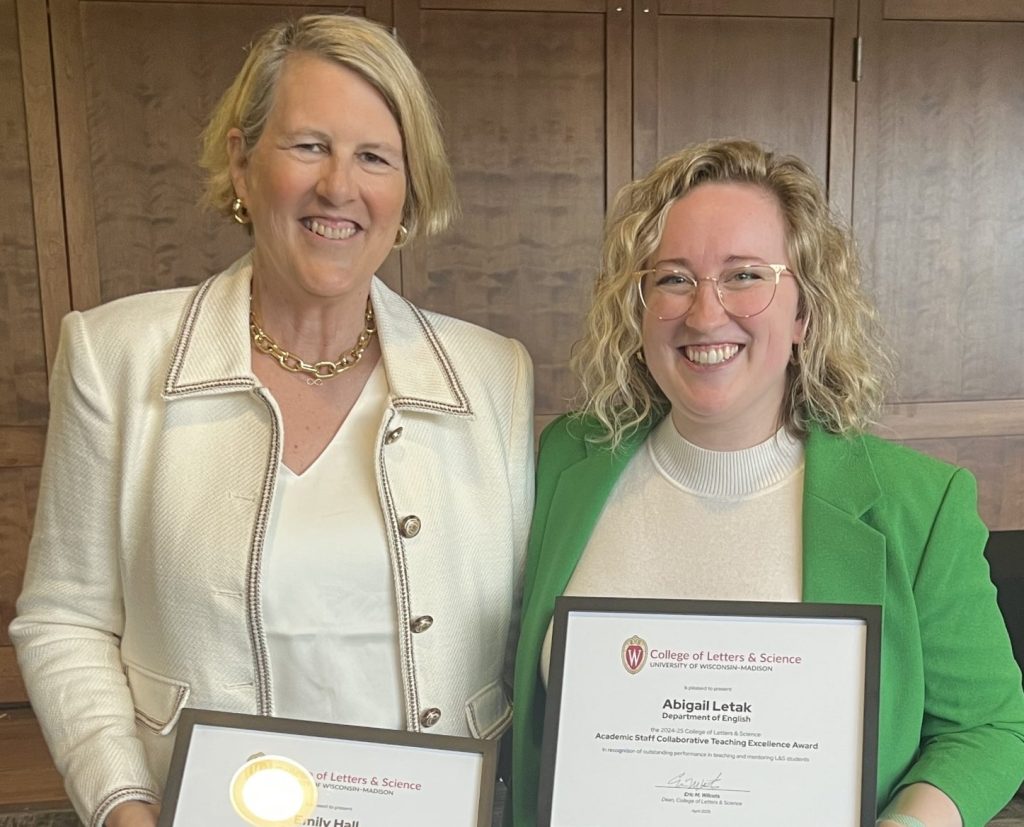 Dr. Hall and Dr. Letak pose with awards.